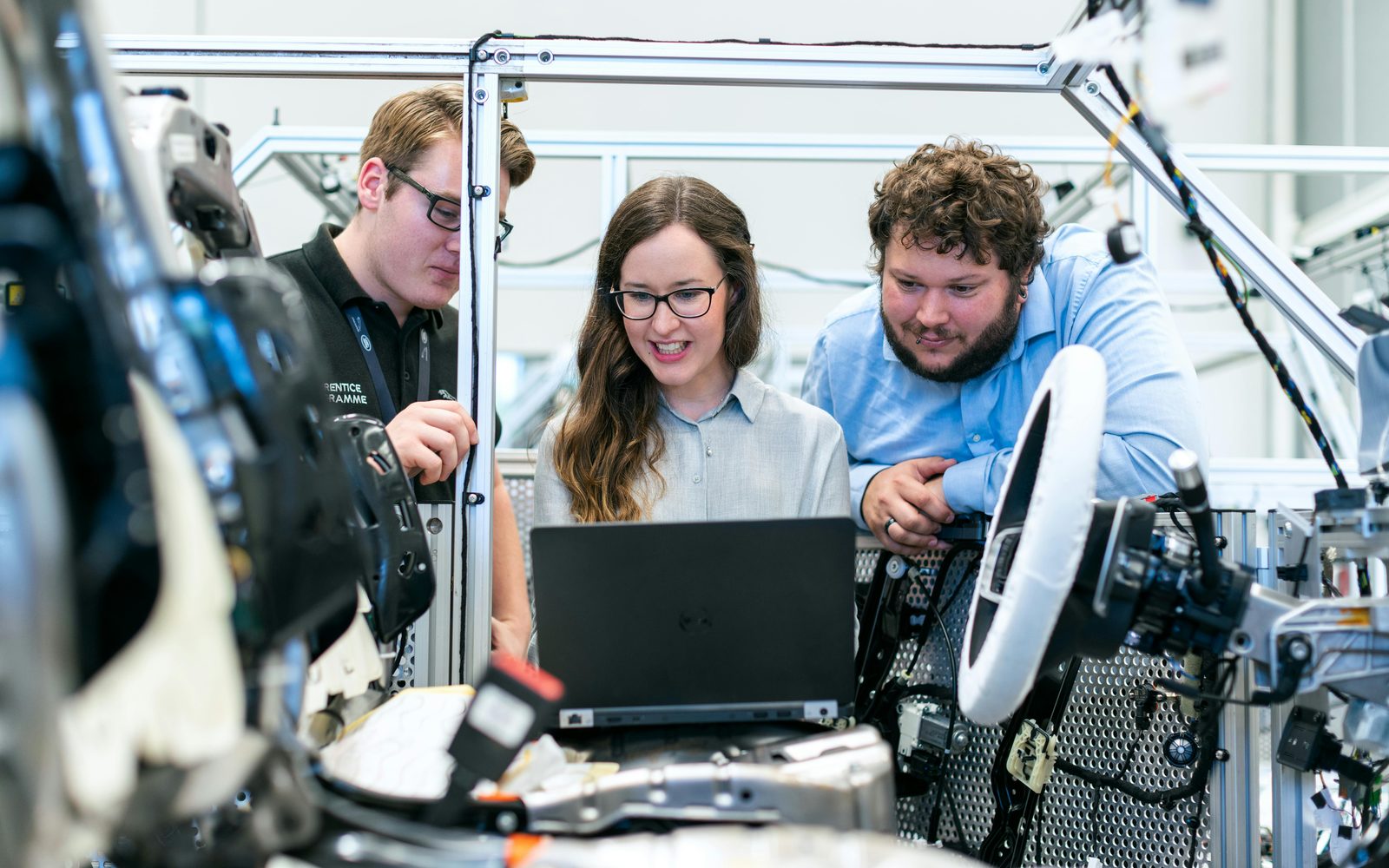 Students in practical work in a digital fabrication workshop